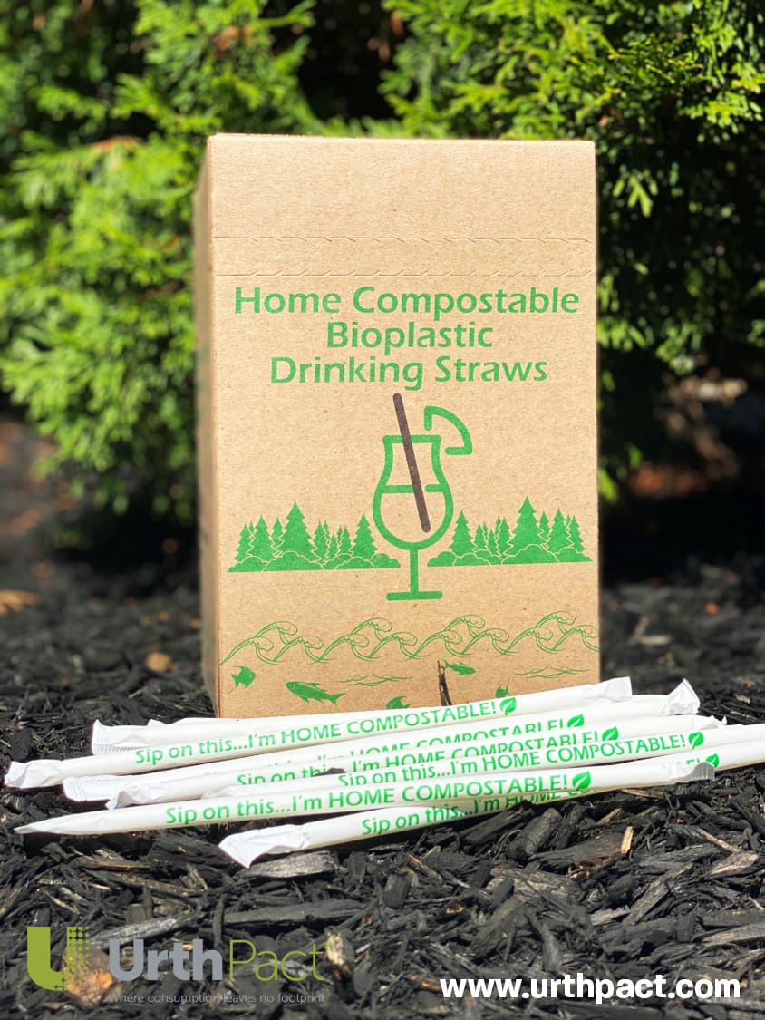 urthpact-compostable-straws A brown paper box with green print stands behind a pile of paper-wrapped, custom manufactured, white-label compostable straws.